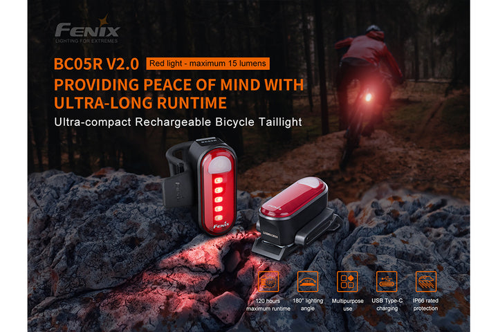Fenix BC05R V2 Bike Tail light sitting on stone in the woods