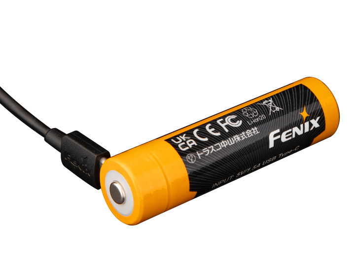 Fenix ARB-L18-4000U high-capacity rechargeable 18650 battery plugged in to charge