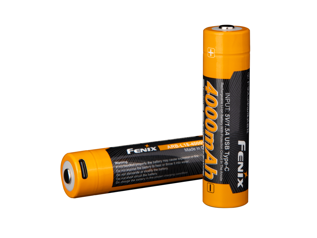 Two Fenix ARB-L18-4000U high-capacity rechargeable 18650 batteries with built-in USB-C charging ports, predominantly black with orange accents.