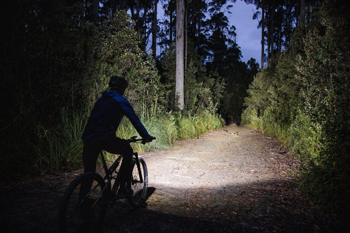 Fenix BC45R Mountain Biking Light used to illuminate a biking trail