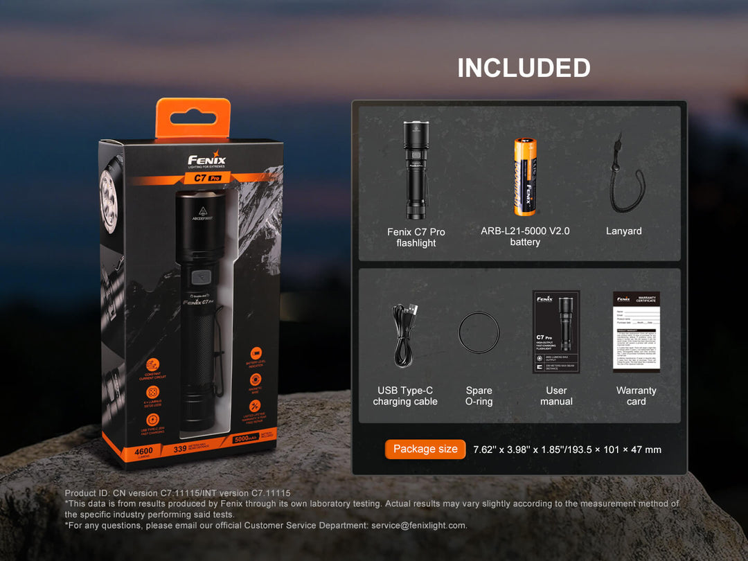 Fenix C7 Pro flashlight packaging with included items displayed on a dark background