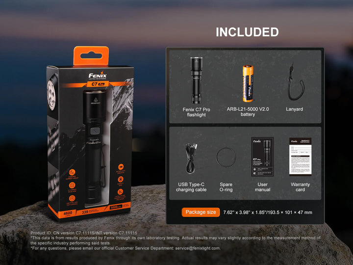 Fenix C7 Pro flashlight packaging with included items displayed on a dark background
