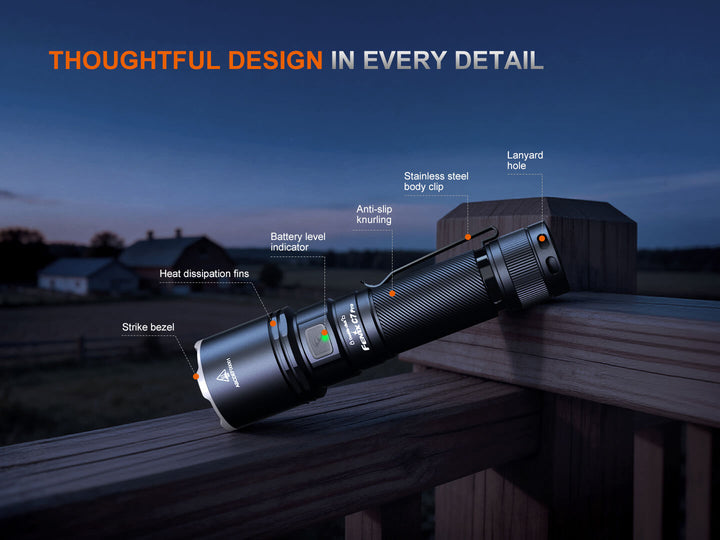 Fenix C7 Pro Quick-Charging Work Flashlight on a wooden surface with labeled features against a night sky.