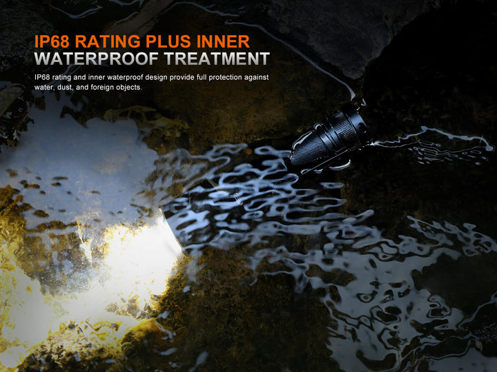 Fenix C7 Pro Quick-Charging Work Flashlight with IP68 rating and waterproof treatment in a wet environment