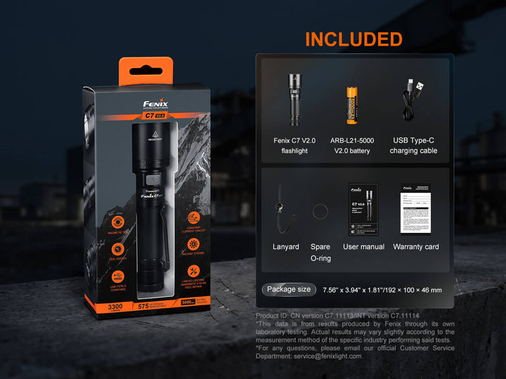 Fenix C7 V2 flashlight packaging with included items displayed on a dark background