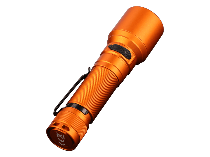 Orange Fenix C7 rechargeable LED flashlight on a black background