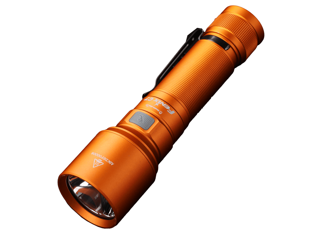 Orange Fenix C7 rechargeable LED flashlight on a black background