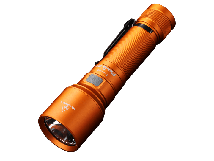 Orange Fenix C7 rechargeable LED flashlight on a black background