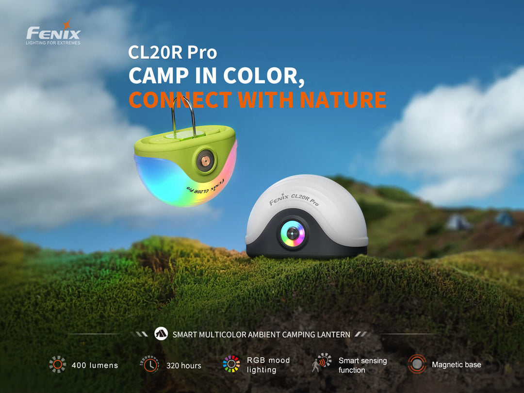 Fenix CL20R Pro camping lantern on grass with scenic background