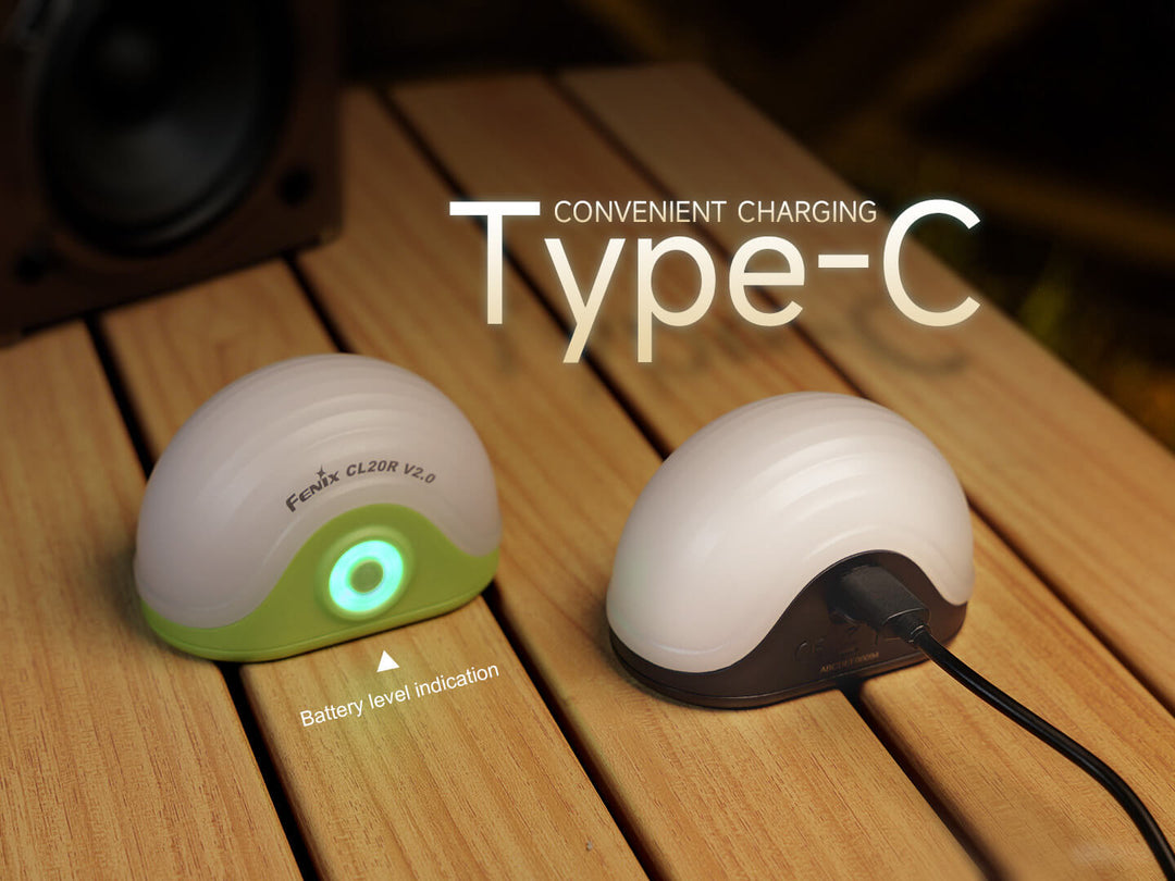 Two Fenix CL20R V2 camping lanterns on a wooden surface with 'Type-C' charging text.