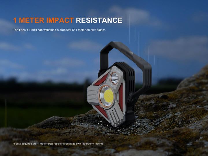 Fenix CP50R flashlight on a rock with '1 Meter Impact Resistance' text