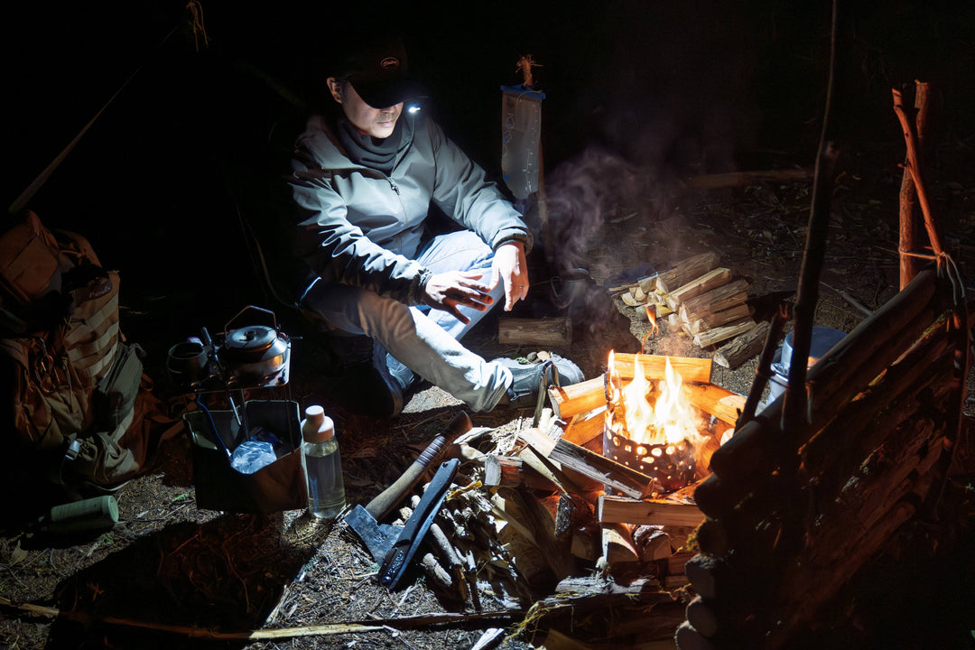 Fenix E04R Rotating Clip Light used to light a campfire