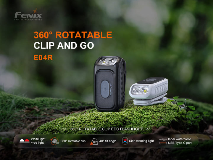 Fenix E04R flashlight with 360-degree rotatable clip on a natural background