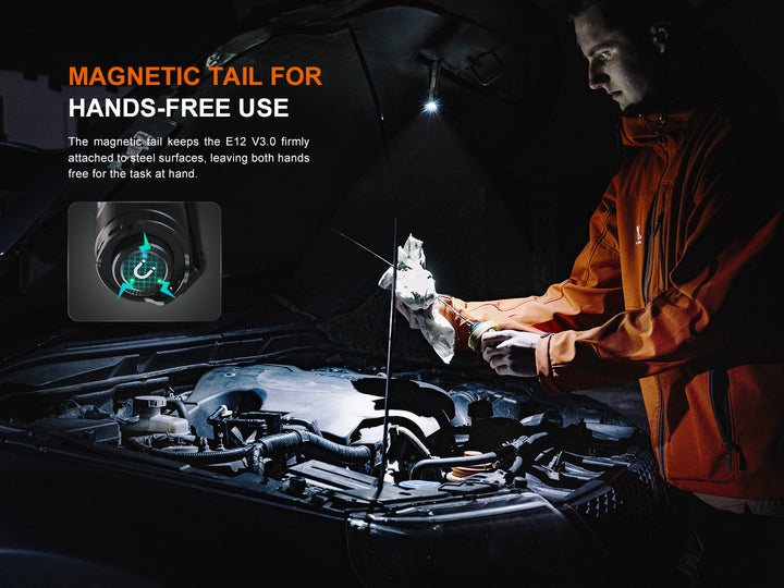 The magnetic base of the Fenix E12 V3 EDC flashlight used to work on a car with the hood up