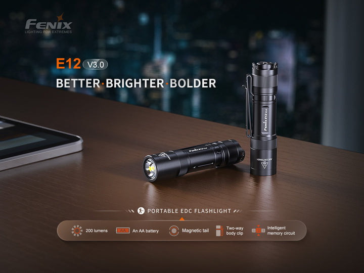 Fenix E12 V3 EDC flashlight on a table