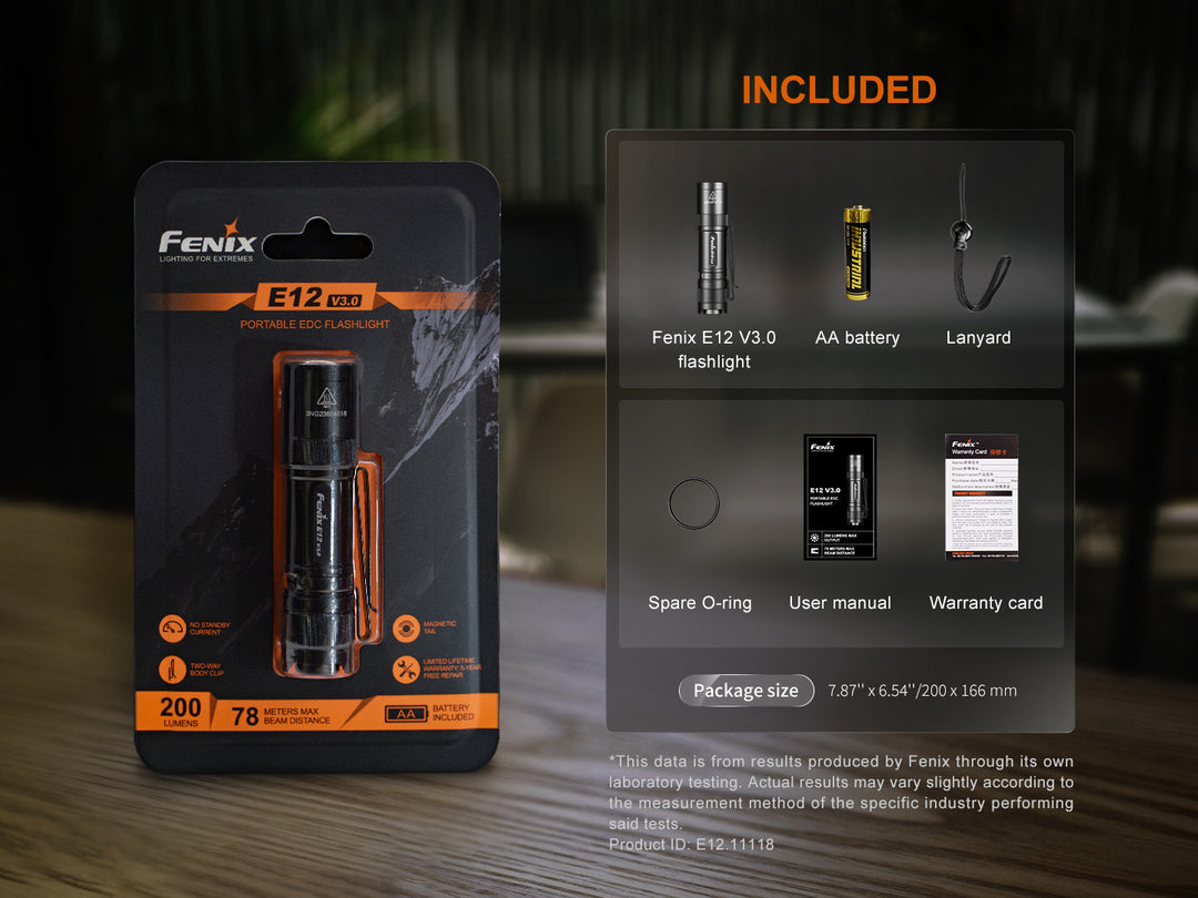 Fenix E12 V3 EDC flashlight in packaging with included accessories