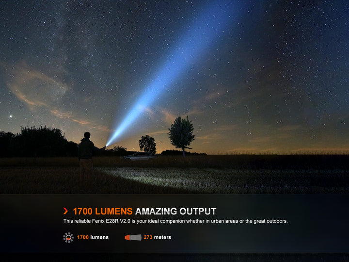 Fenix E28R V2 rechargeable EDC flashlight shining into the sky