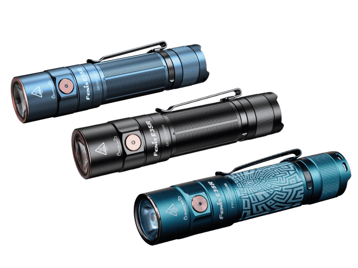 Three flashlights in blue, black, and a patterned design on a black background