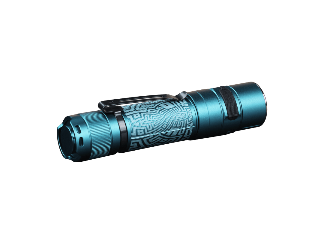 Turquoise Fenix E35R high-performance rechargeable LED flashlight with tribal design on a black background