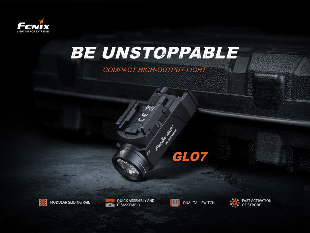 Fenix GL07 flashlight leaning against a tactical case