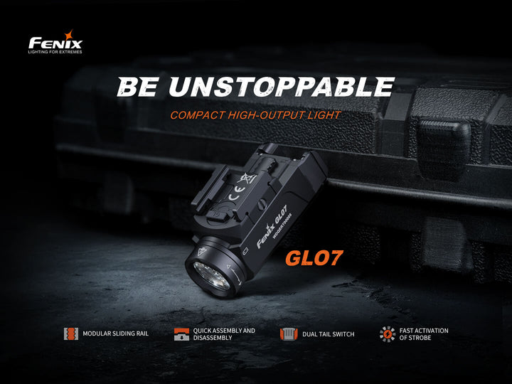 Fenix GL07 flashlight leaning against a tactical case