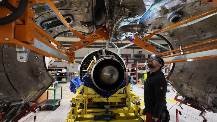 Person inspecting an aircraft using the Fenix HM53R headlamp 