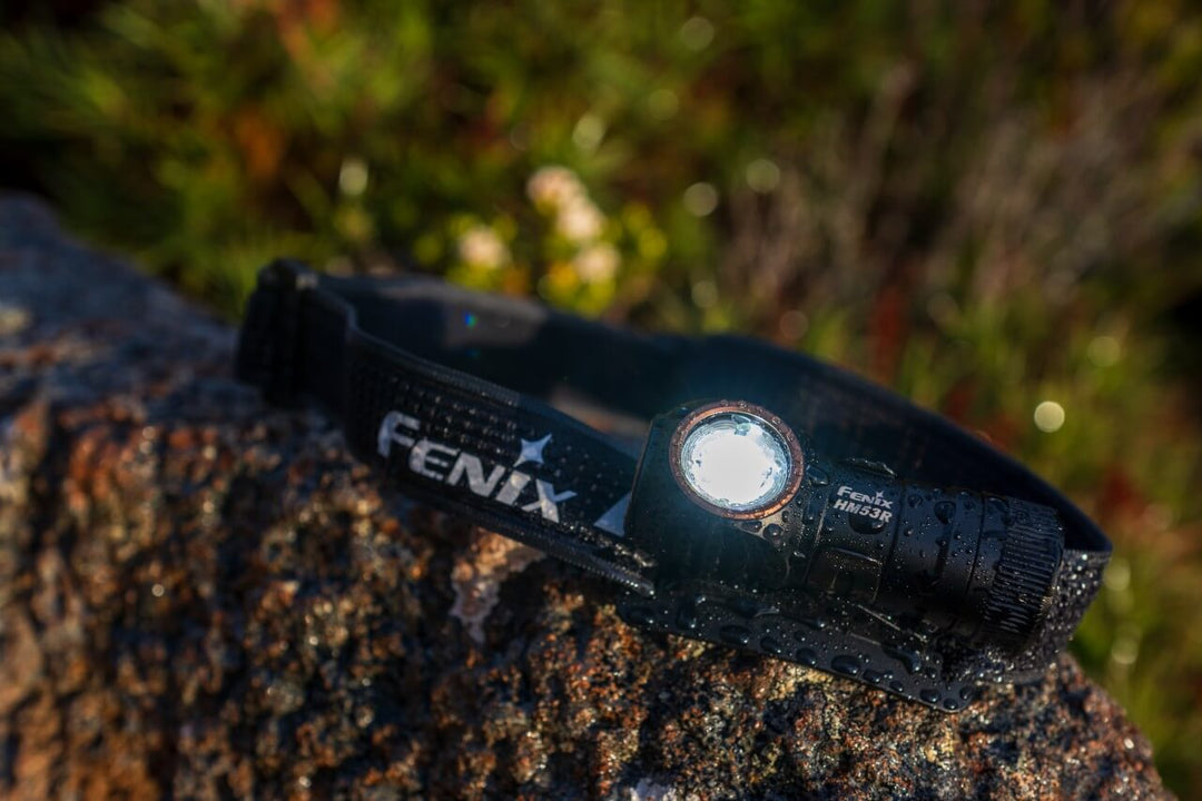 Wet Fenix HM53R headlamp on stone