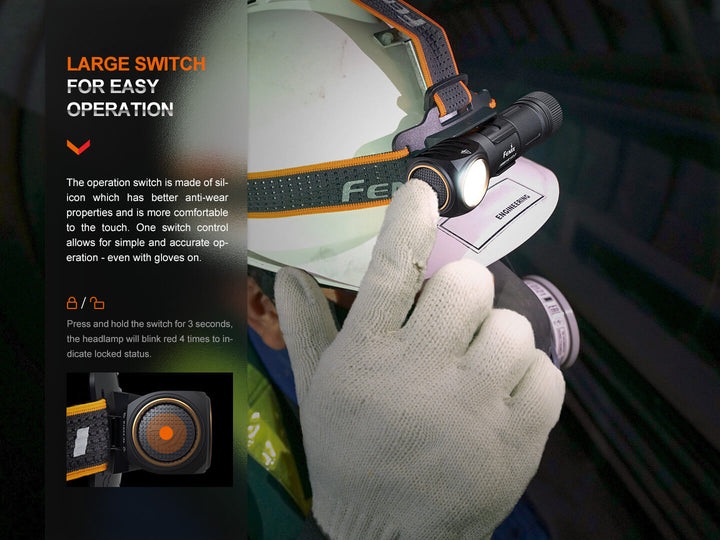 A worker using the large button of the Fenix HM61R V2 rechargeable LED headlamp with a gloved hand
