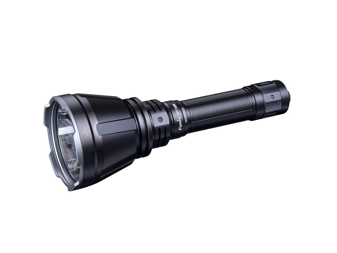 A black Fenix HT18R rechargeable LED hunting light with a large lens at one end and a tactical tail switch.
