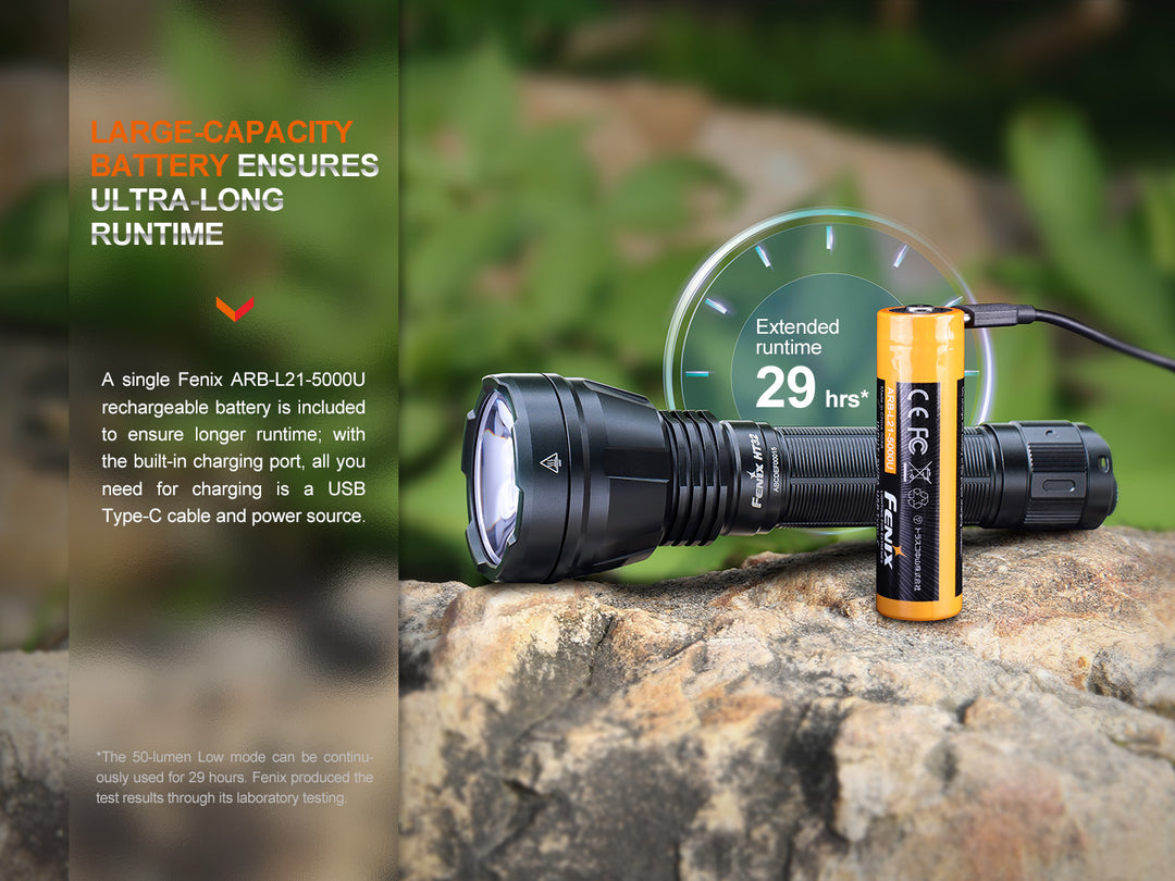 Fenix HT32 hunting flashlight on stone with battery charged via its USB port