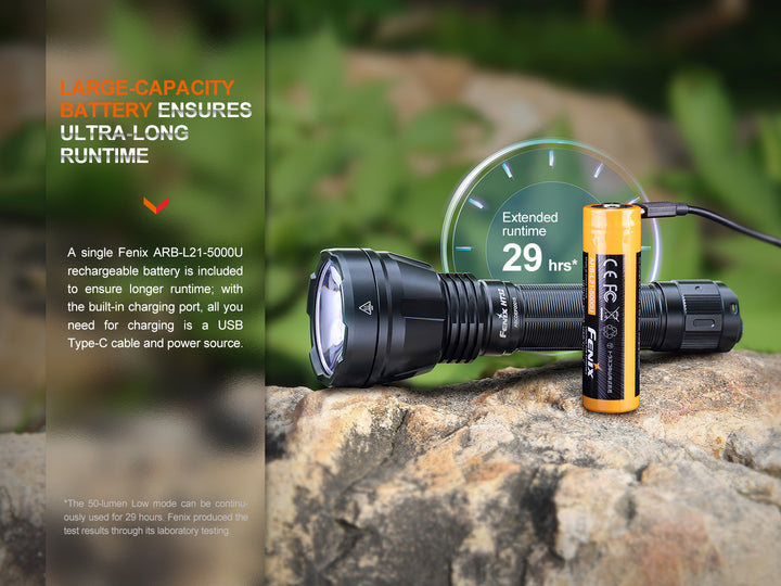 Fenix HT32 hunting flashlight on stone with battery charged via its USB port