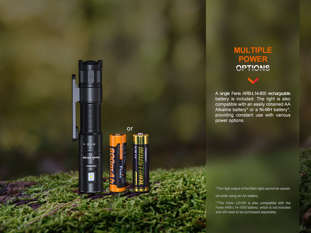 Fenix LD12R dual light flashlight on a mossy stone with two different battery options