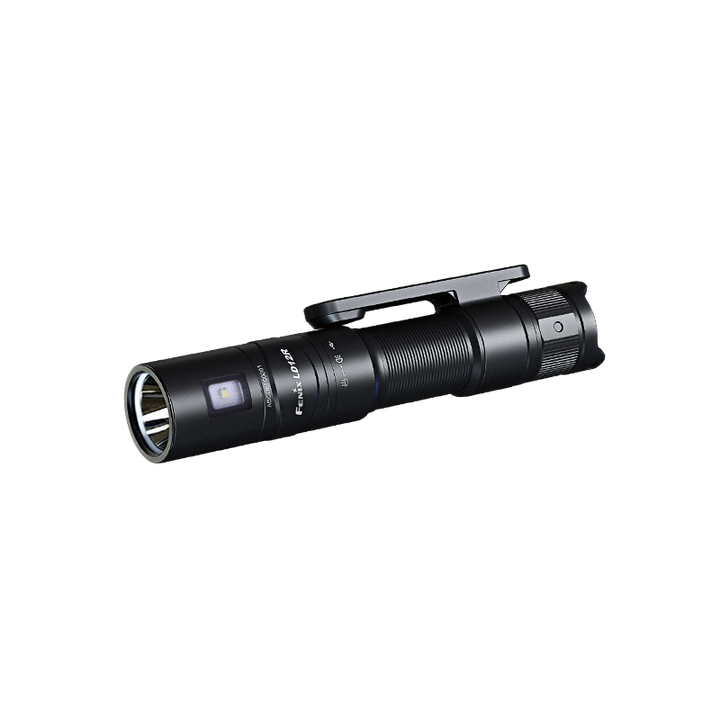 A black Fenix LD12R dual light flashlight with a visible front LED and side LED, placed on a flat surface.