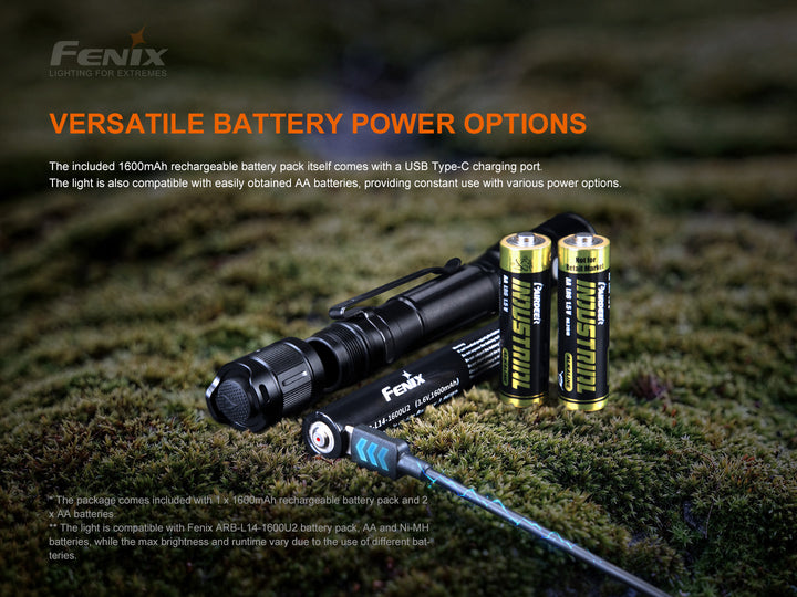 Fenix LD22 V2 compact LED flashlight on mossy stone with the different batteries that can be used in it
