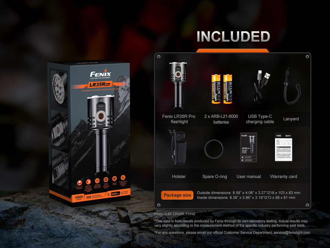 Fenix LR35R Pro flashlight packaging with included items on a dark background