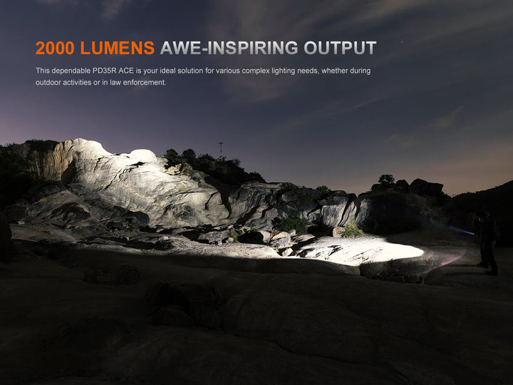 Fenix PD35R ACE Customizable Flashlight illuminating a rocky landscape with text about lumens and product features.