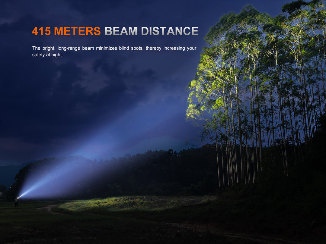 Fenix PD36R ACE flashlight beam distance demonstration with trees in the background