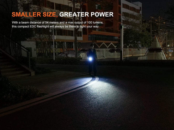 Fenix SilvGlow Keychain Light used for walking in a city at night