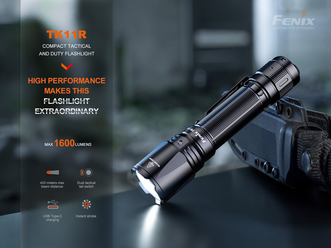 Fenix TK11R compact tactical flashlight on table