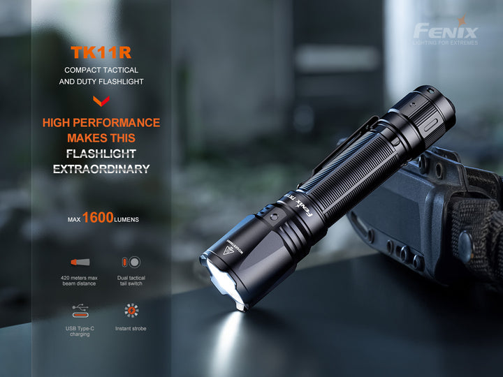 Fenix TK11R compact tactical flashlight on table