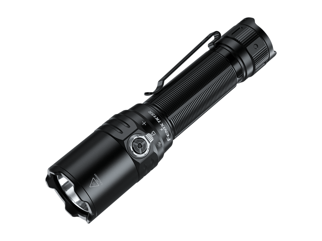 Black Fenix TK15R adaptive flashlight on a black background
