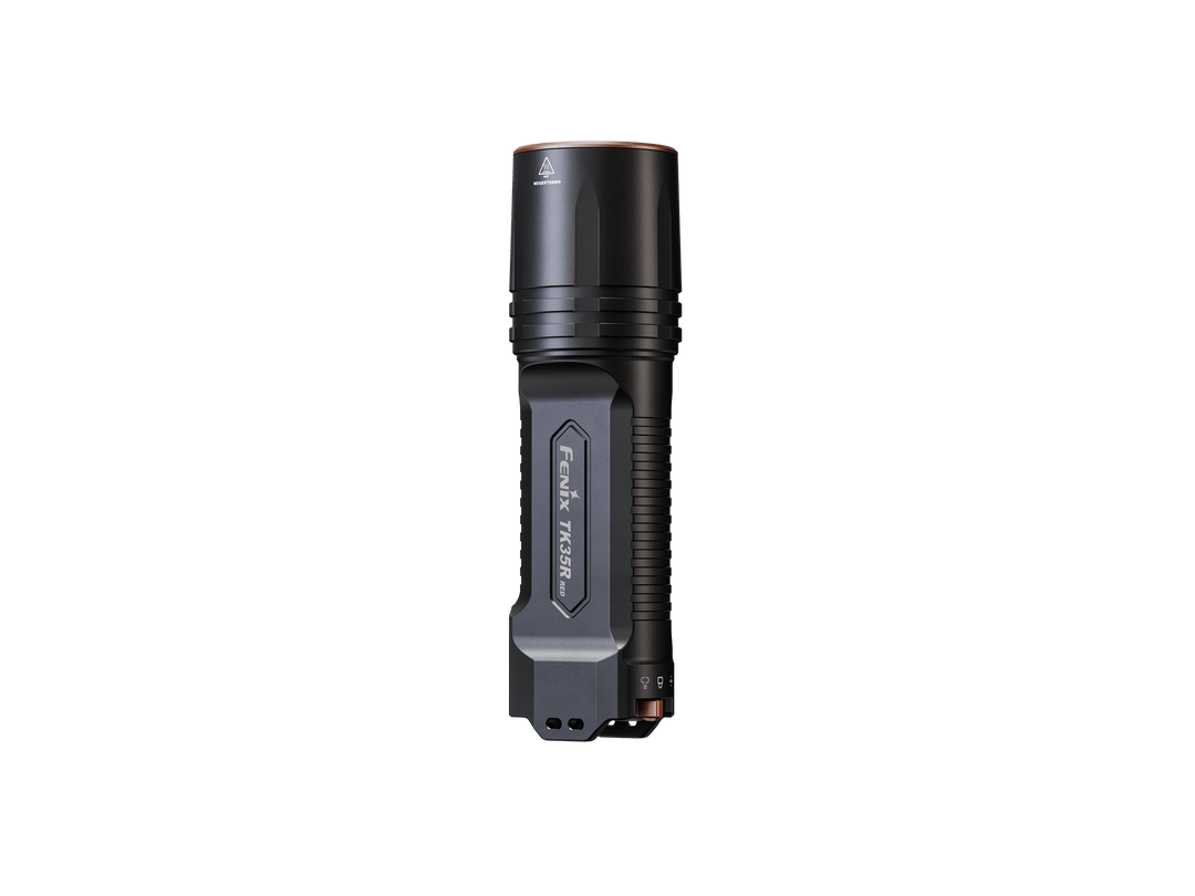 Black Fenix TK35R Red Version flashlight on a black background