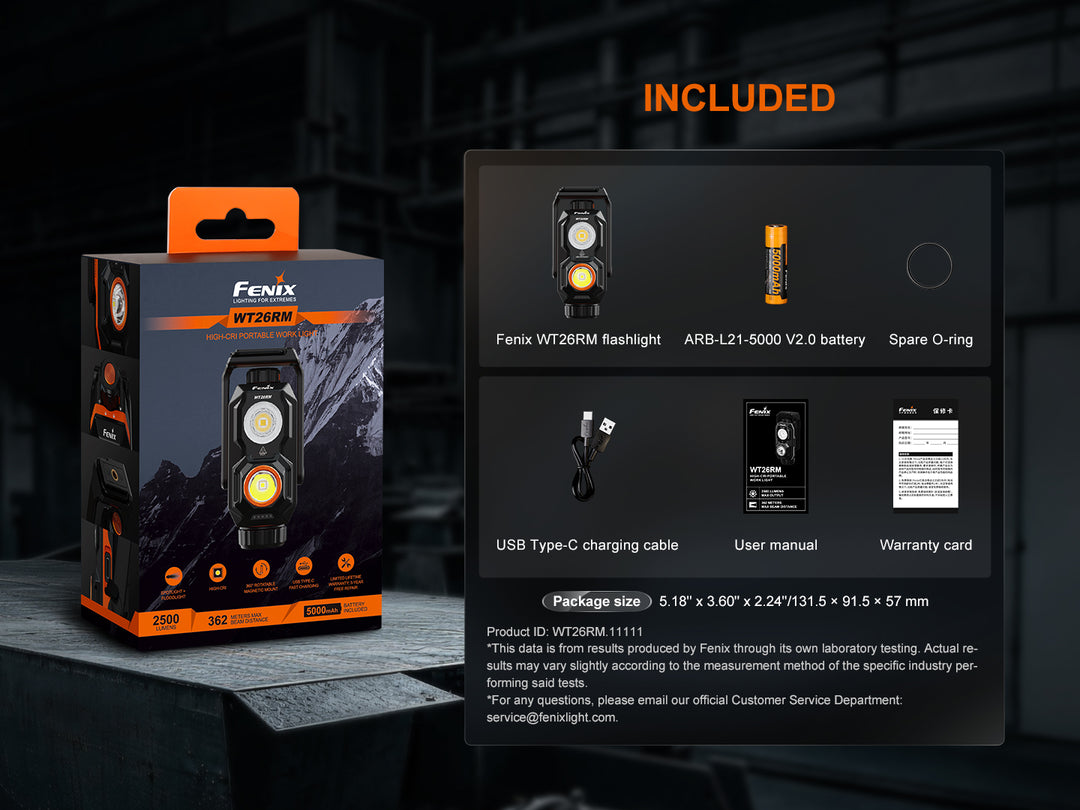 Fenix WT26RM retail packaging next to its included contents: flashlight, ARB-L21-5000 V2.0 battery, spare O-ring, USB Type-C charging cable, user manual, and warranty card