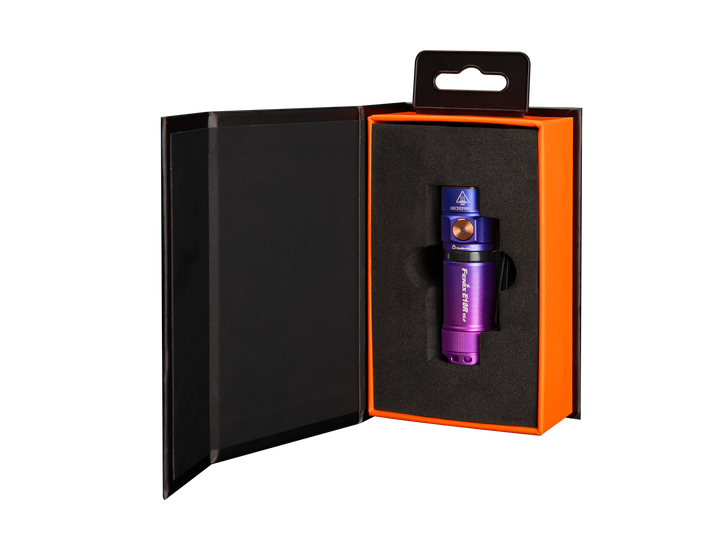Fenix e18r v2 rechargeable flashlight in purple with gift box packaging