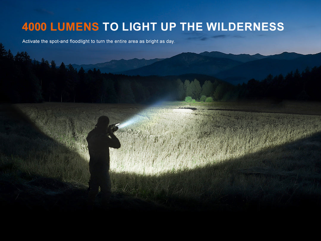 Hunter lighting a wide field with the Fenix HT32R spot-and-floodlight beam, 4000 lumens to light up the wilderness