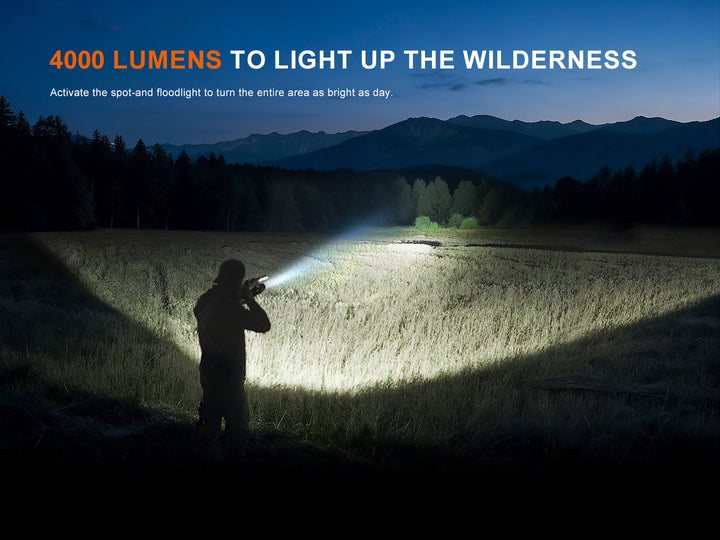 Hunter lighting a wide field with the Fenix HT32R spot-and-floodlight beam, 4000 lumens to light up the wilderness