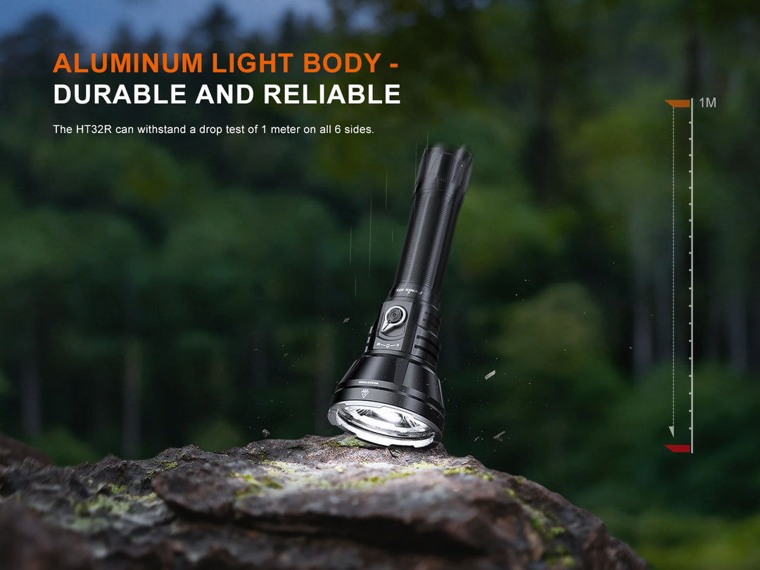 Fenix HT32R aluminum body dropped onto a rock, impact resistant to 1 meter on all sides