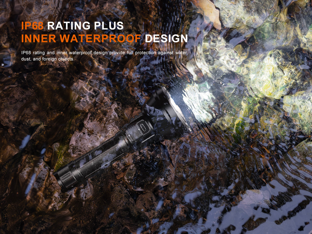 Fenix HT32R lit underwater in a stream, IP68 rating with inner waterproof design