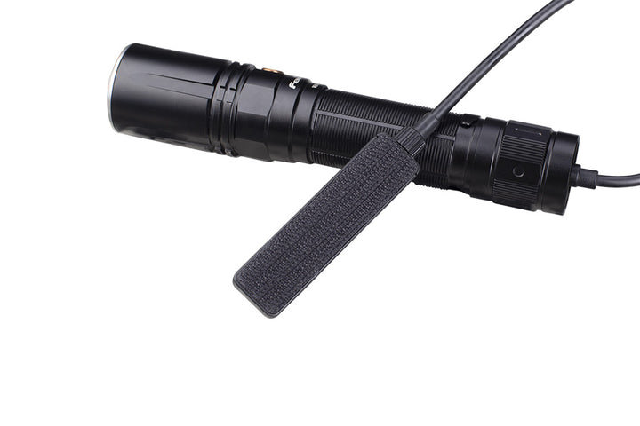 Fenix AER-04 Tactical Remote Switch as viewed from the back with a flashlight attached