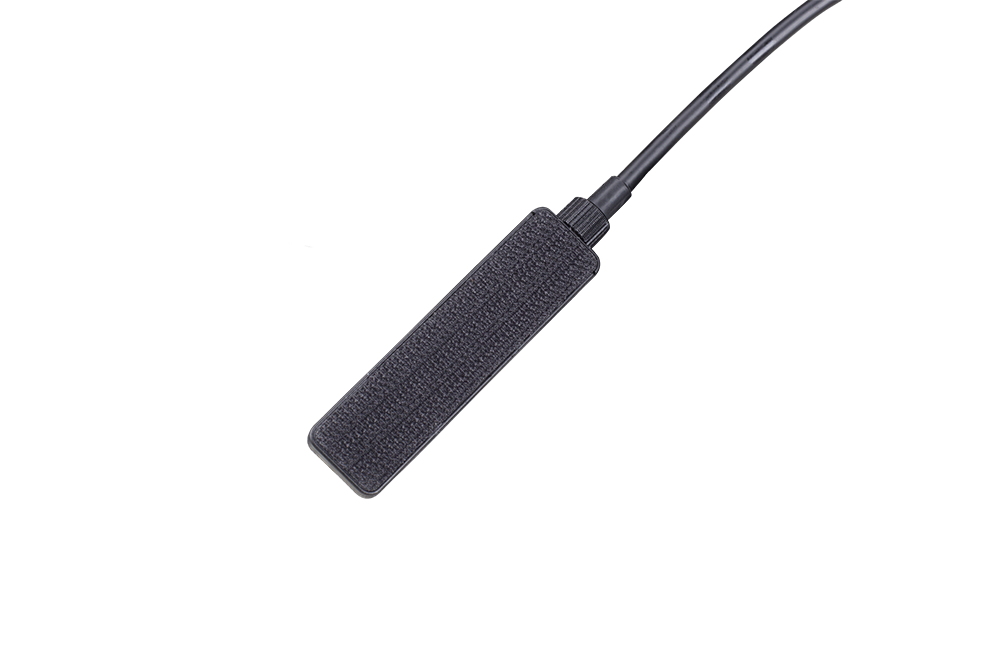 The backside of the Fenix AER-05 remote pressure switch with velcro attachment